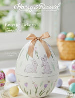 A beautiful display of gourmet gift baskets and fresh pears from the Harry & David catalog.