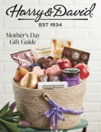 A beautiful display of gourmet gift baskets and fresh pears from the Harry & David catalog.