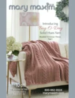 Mary Maxim Catalog: A vibrant display of colorful yarn skeins and finished knitting patterns from a professional craft catalog.