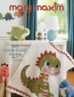 Mary Maxim Catalog: A vibrant display of colorful yarn skeins and finished knitting patterns from a professional craft catalog.