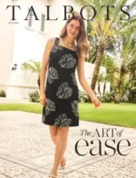 Talbots Catalog: A woman wearing a navy blazer and white trousers