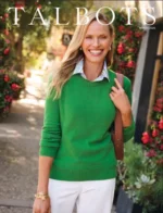 Talbots Catalog: A woman wearing a navy blazer and white trousers