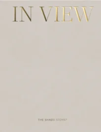 The Shade Store Catalog: Elegant custom window shades in a brightly lit modern living room.