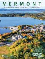 Vermont Vacation Guide: A scenic view of a Vermont landscape featuring a historic white church and colorful autumn trees.