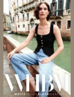 Elegant woman wearing a monochrome black and white outfit from the White House Black Market catalog.